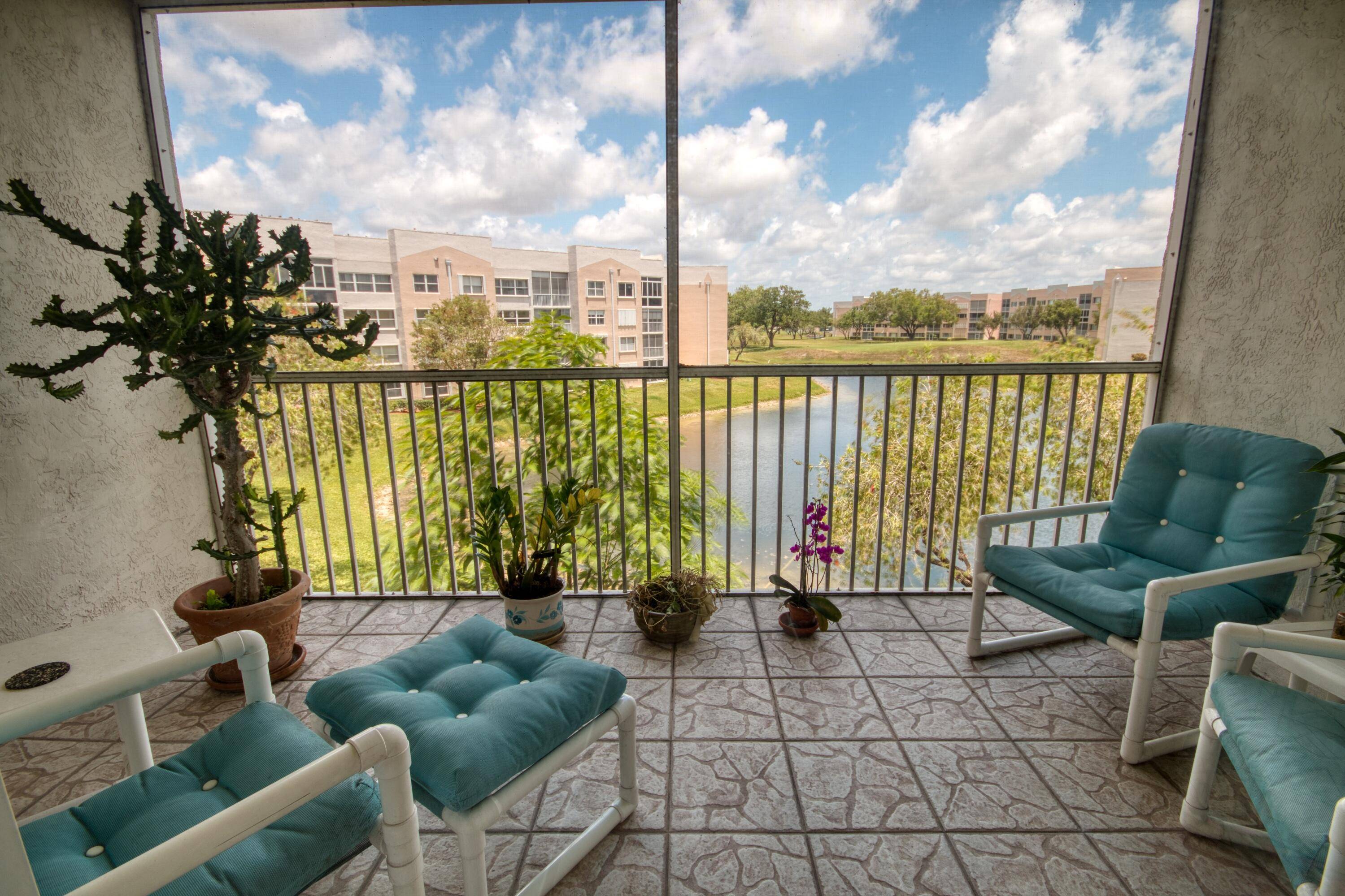 . PRICED TO SELL... Desirable, spacious, original Portofino model in this sought after Sunrise Lakes Phase 4 condo.