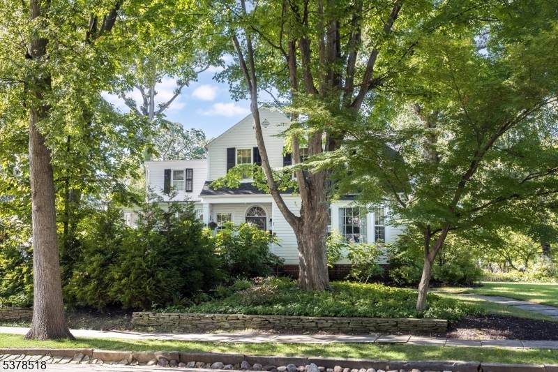 Step into timeless elegance in this beautifully preserved and thoughtfully updated 4 bedroom, 2.
