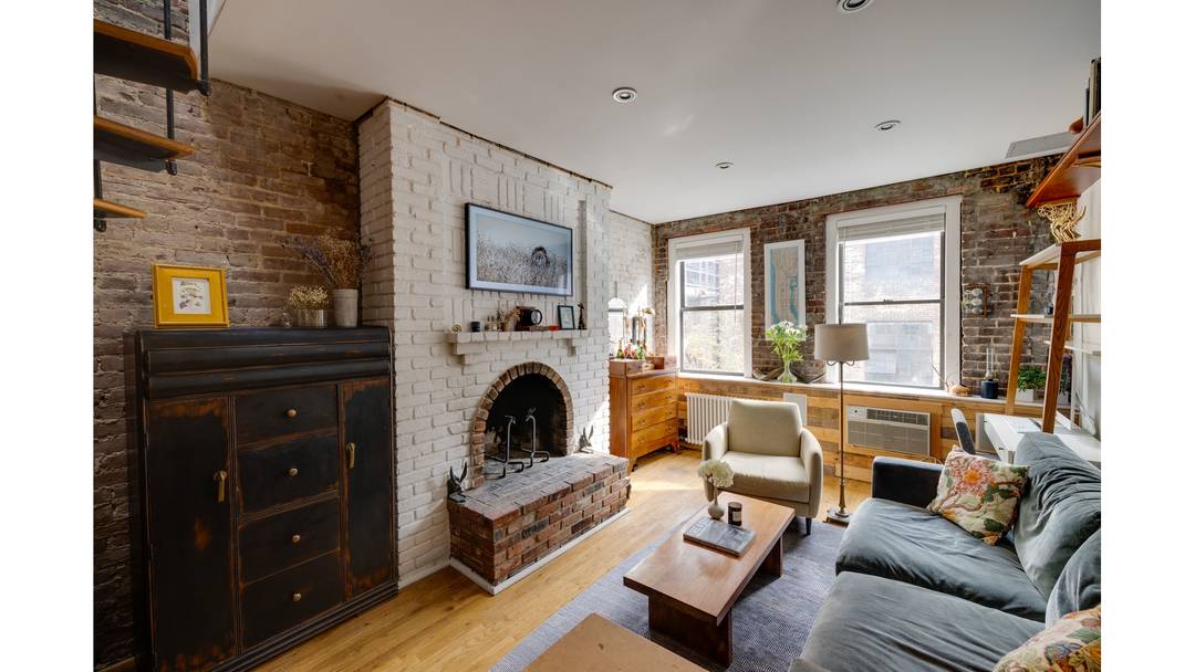 Welcome home to this stunning pre war duplex penthouse with private roof terrace, spanning the top two floors of an elevator building on the Upper East Side.