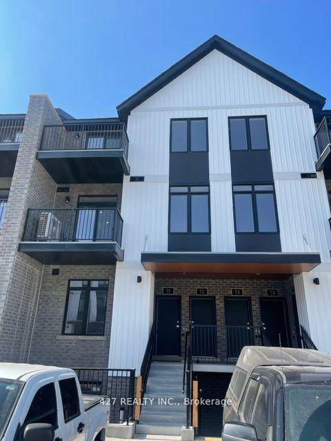 This exceptional two story townhouse is graced with elegance.