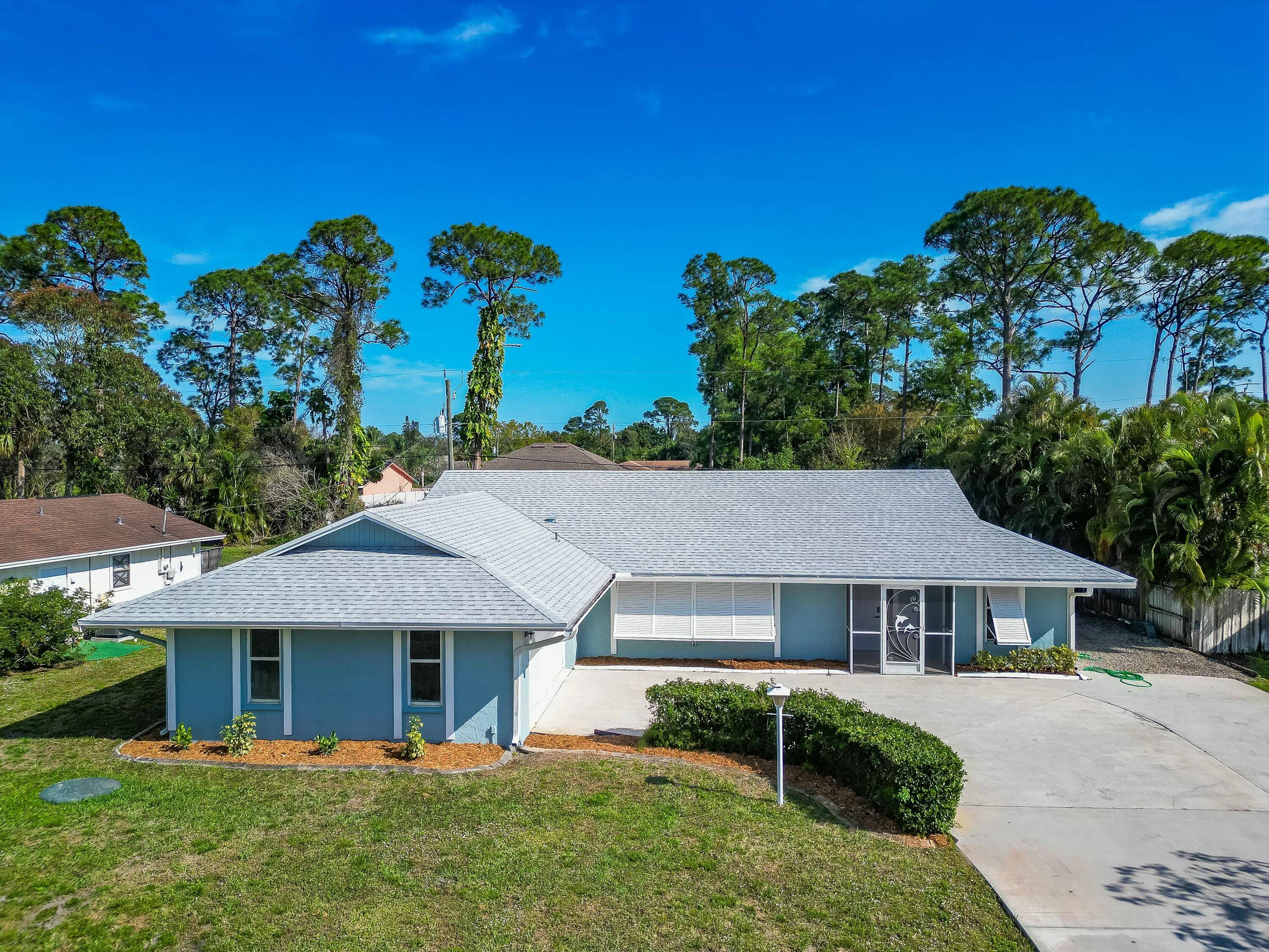 This beautifully remodeled pool home is move in ready and offers the perfect blend of style and functionality.