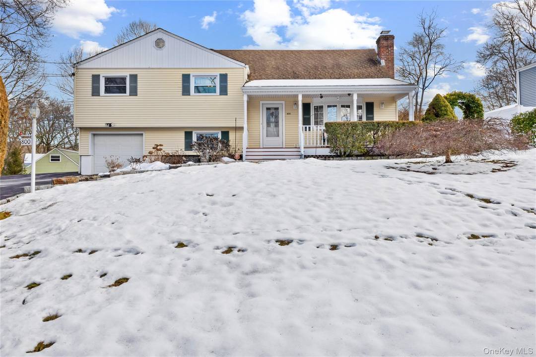 Meticulously maintained and thoughtfully updated, this 4 bedroom, 2 bath split level home is set on a level, beautifully landscaped lot, offering the perfect blend of warmth, comfort, and functionality.