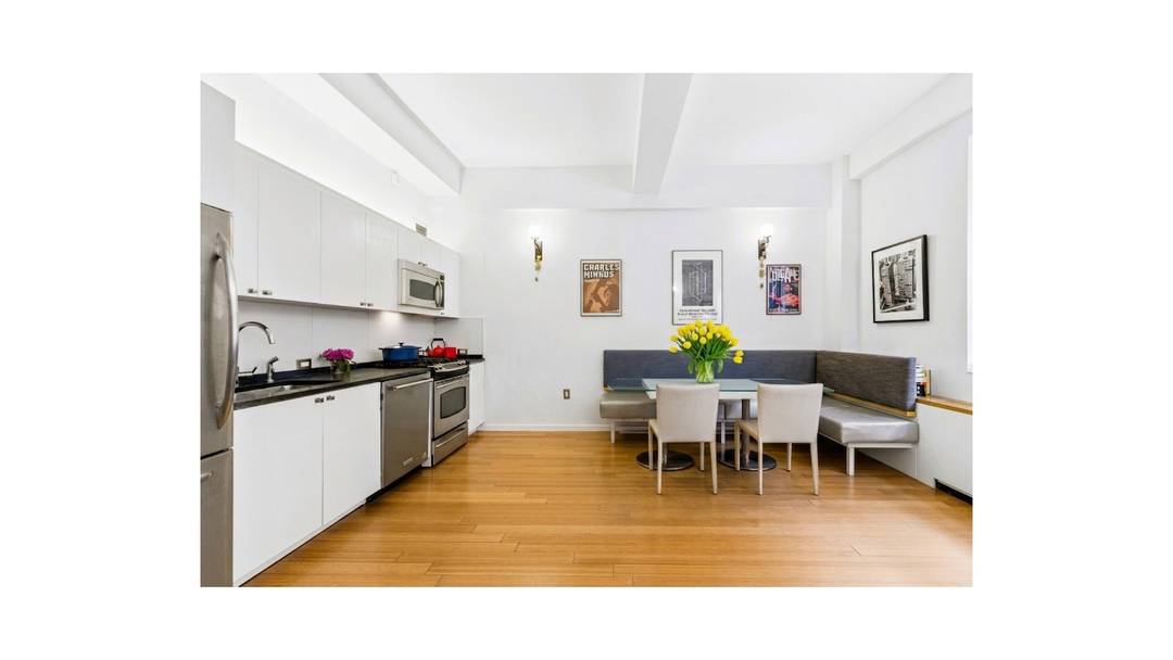 Experience contemporary elegance in this approximately 1300 square foot BellTel Loft situated within the 1929 Landmarked Art Deco Building at 365 Bridge Street.