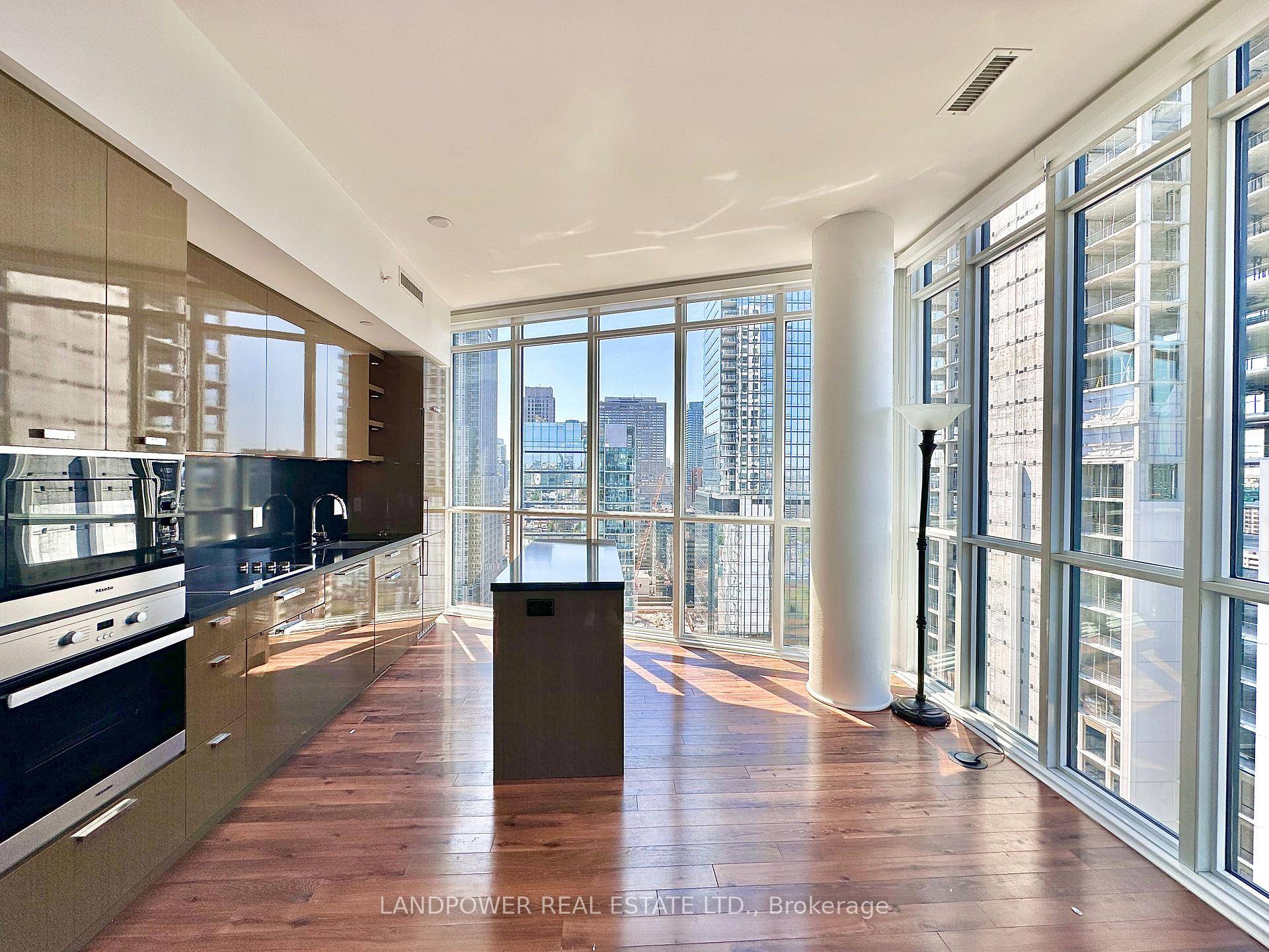 2 Bedroom Corner Unit with Soaring 10 Ft Ceiling in the Heart of Yorkville with 2 PARKING SPOTS !