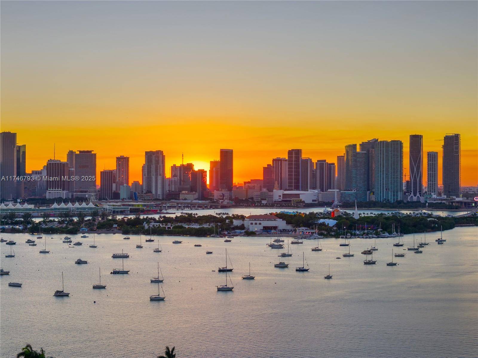RARE WATERFRONT DOUBLE LOT ON THE VENETIAN ISLANDS WITH APPROVED PLANS amp ; READY TO BUILD BY LUXURY ARCHITECT SAOTA WITH MAGICAL SUNSETS OVER THE BAY amp ; CITY !