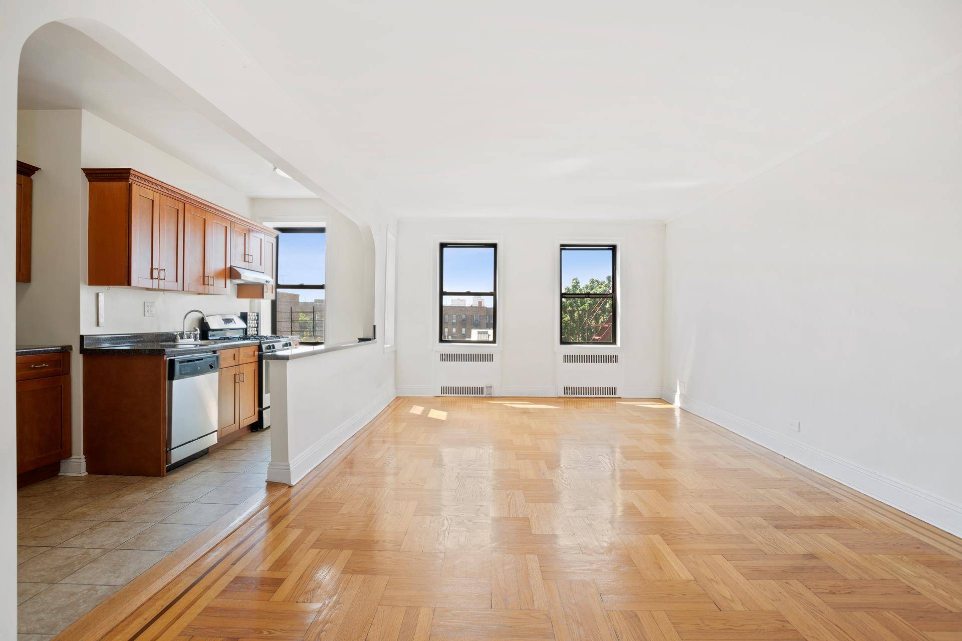 This top floor, south facing apartment is flooded in sunlight.