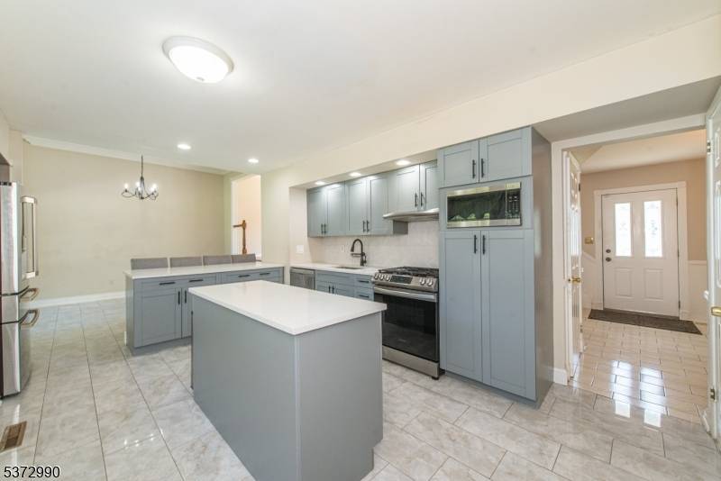 Welcome to 34 Maplewood a beautifully updated Colonial Split in a fabulous neighborhood, just minutes from Northvail School and everyday conveniences.