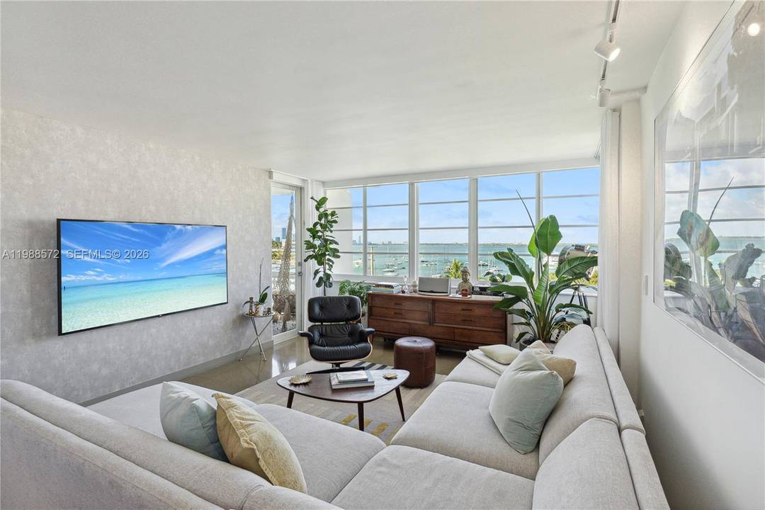 Discover this stunning top floor designer unit in a boutique waterfront building next to Sunset Harbour, nestled at the end of a quiet cul de sac near the Venetian Islands, ...