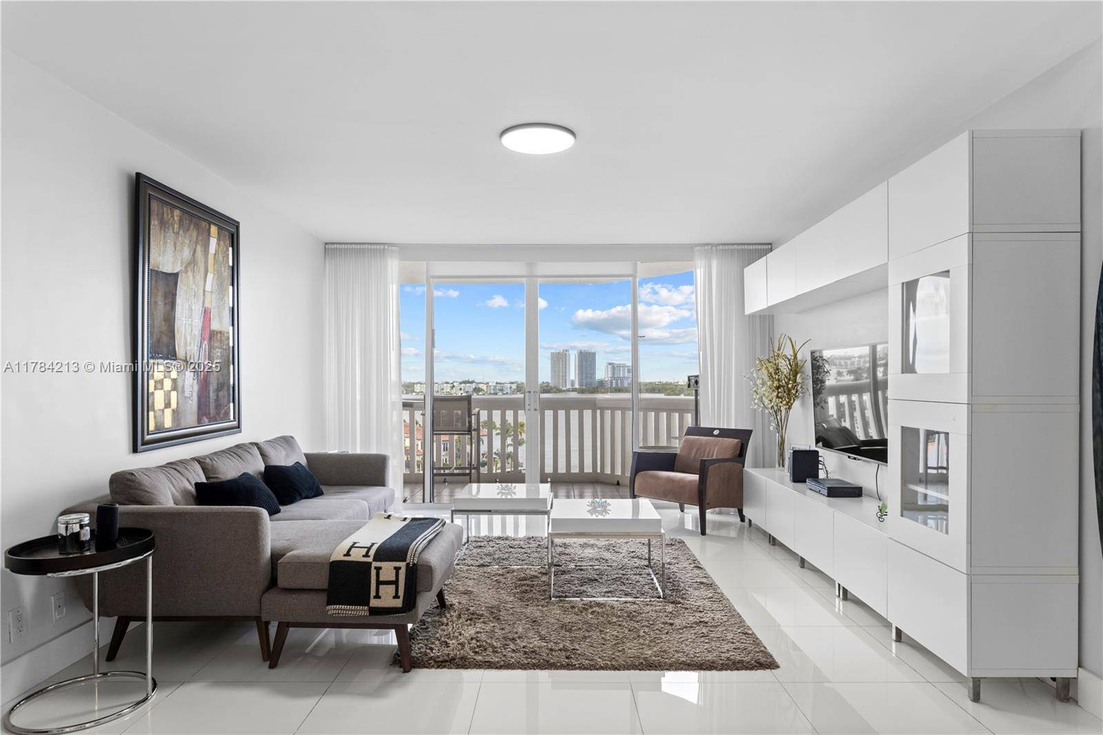 GORGEOUS 2 BED 2 BATHS in Aventura Amazing views of intracoastal Modern renovated unit white tile flooring update kitchen stainless steel appliances led lights Large terrace Enjoy the island club ...
