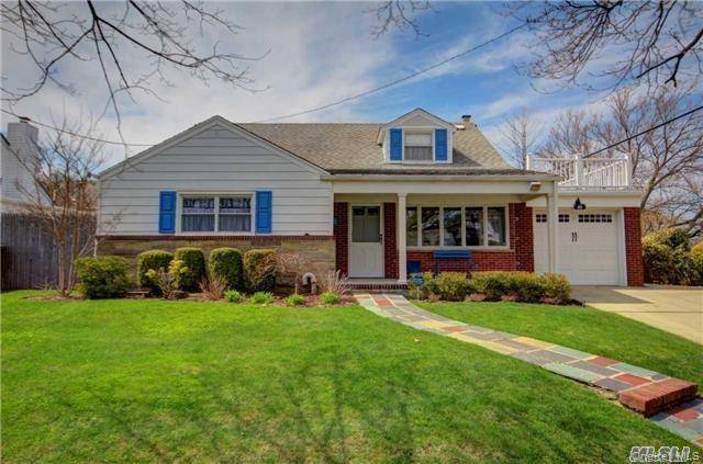 Luxury Listing Style Experience coastal living at its finest in this exceptional year round 5BR 3BA Cape set on a prestigious tree lined beach block with a dedicated beach entrance.