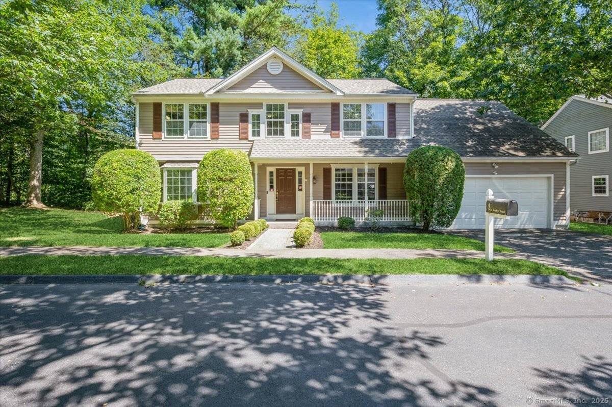 Immaculate colonial in the Twin Ledge Association.