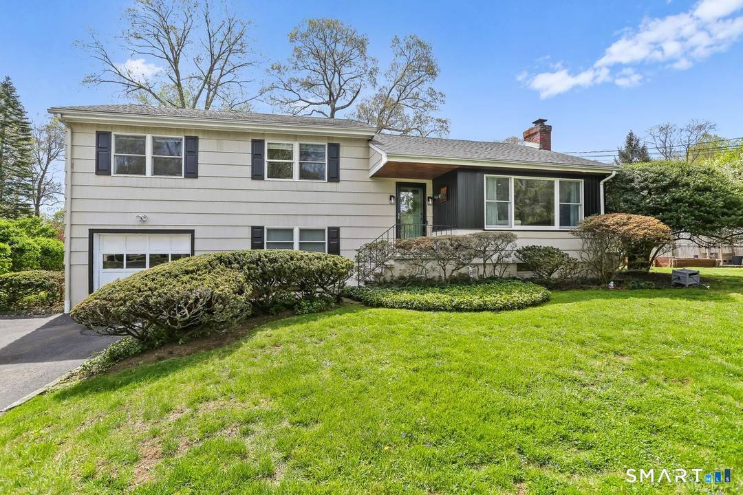 Perfectly situated on the Darien and New Canaan borders, this home is nestled within a highly sought after neighborhood known for its mature trees, established landscaping, and strong property values ...