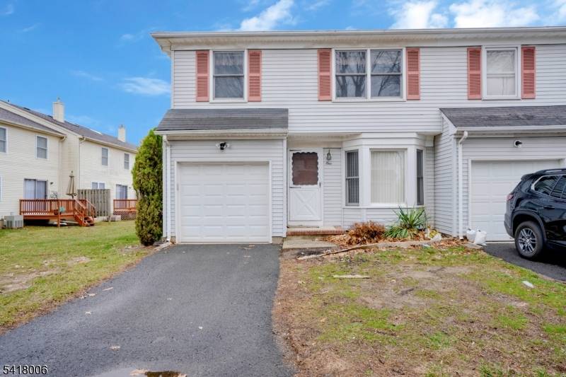 Don't Miss this Rare Opportunity to own a Generously Sized End Unit Townhouse in sought after Middlesex Village !