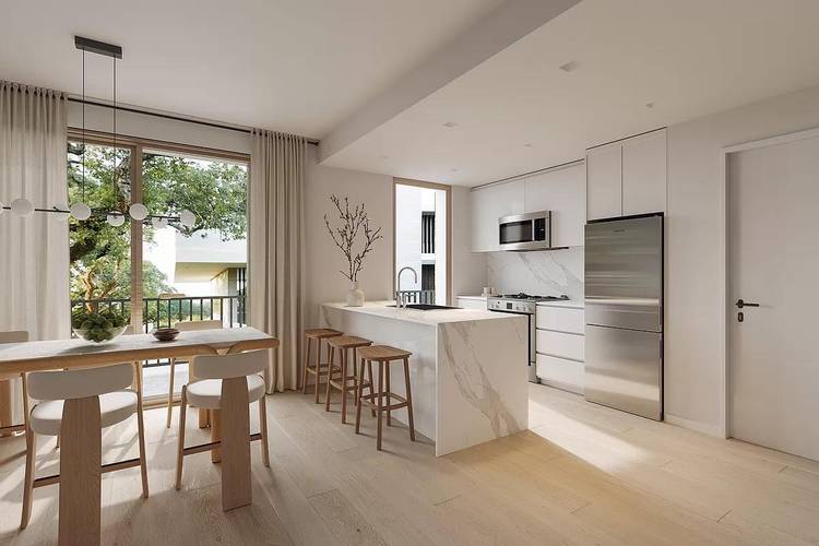 Residence Unit 302A spacious and sun filled 3 bedroom, 3 bath residence offering an ideal layout with two expansive primary suites.