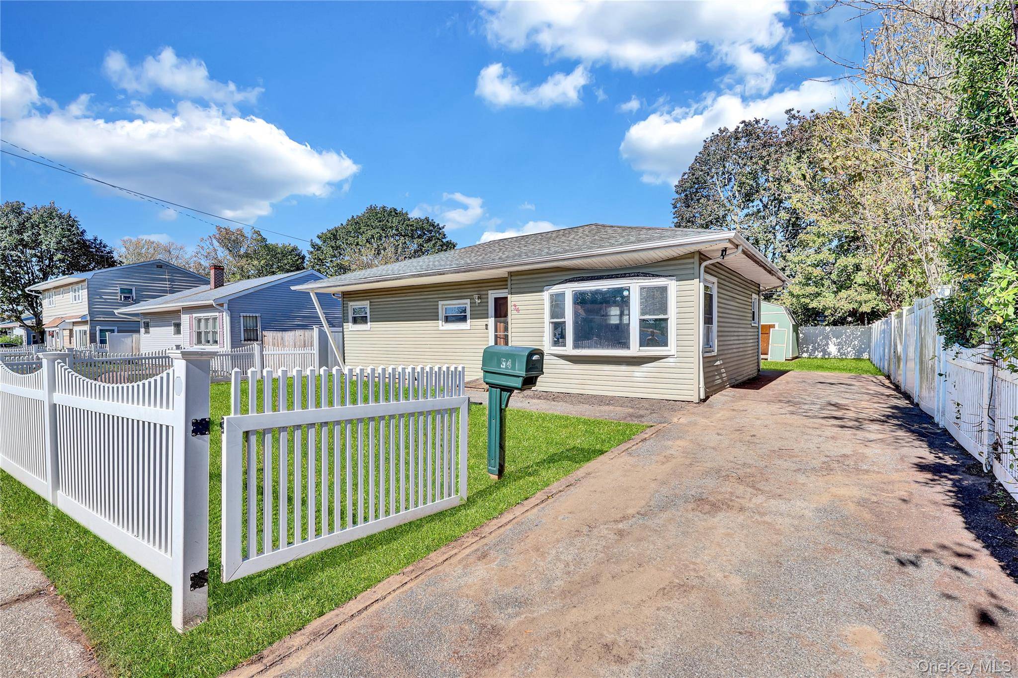 Ranch style home. This home features three bedrooms, a full bath, and eat in kitchen.