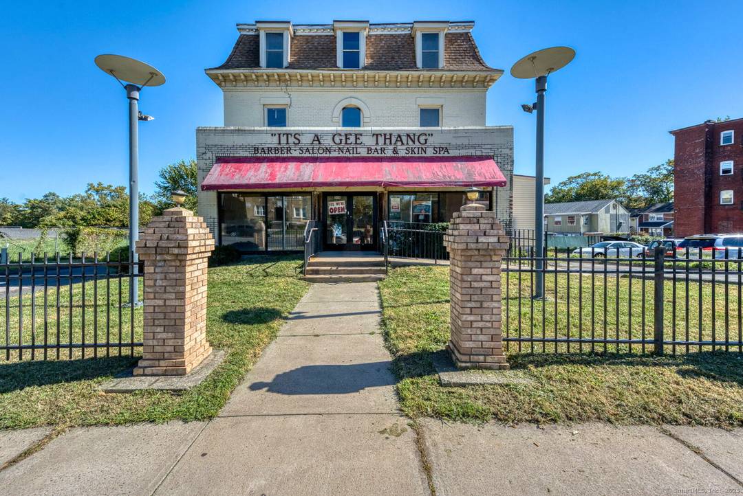 Step into a legacy of style, wellness, and community at 2404 Main Street, a multi level commercial gem in the heart of Hartford.