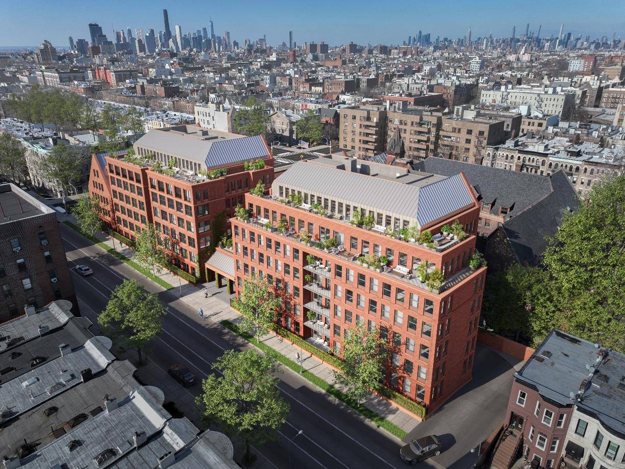 Designed by Hopestreet and Morris Adjmi Architects, this iconic property exudes sophistication with its blend of textured red brick, sleek zinc shingles, and striking gables.