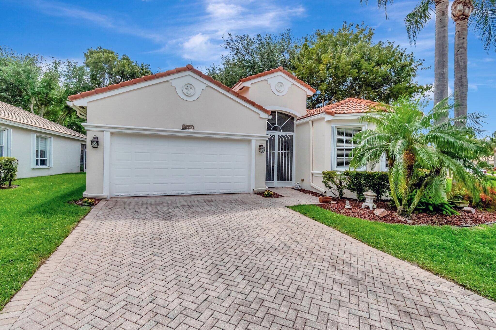 Welcome Home ! This Cambridge model home is situated on a lakefront pie shaped lot with almost 2, 200 sq.