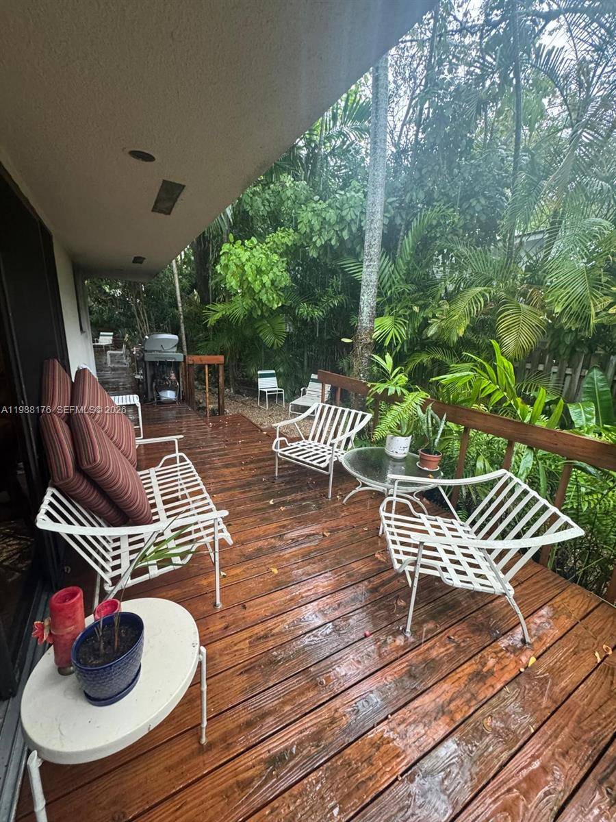 Discover the ultimate North Coconut Grove lifestyle with this exceptional 3 bedroom, 2.