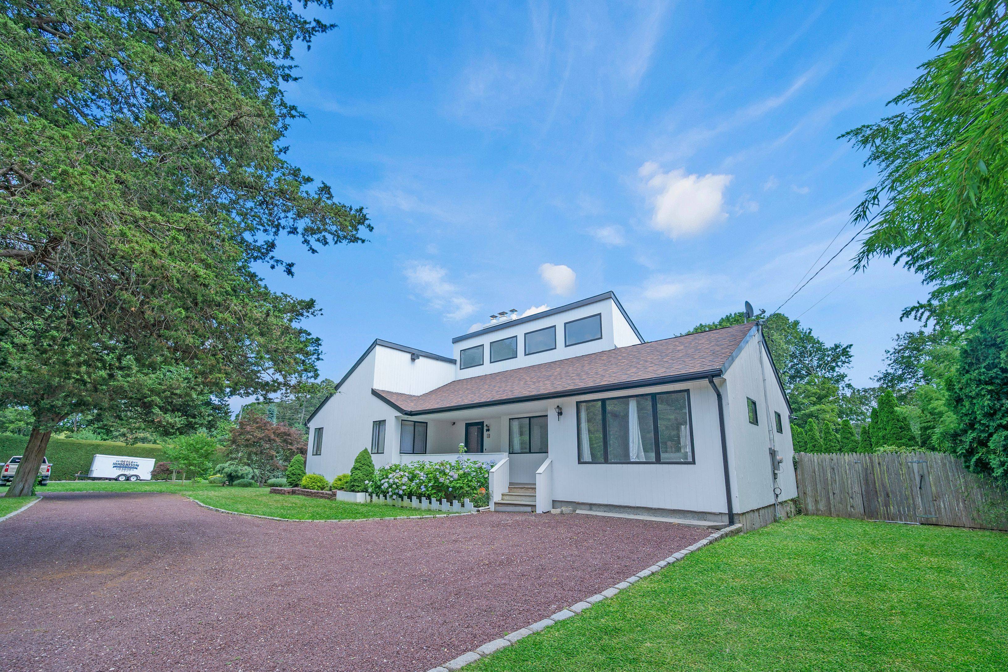 Nestled on a private street, this exquisite 3 bedroom, 2 bathroom Hamptons retreat offers the perfect blend of luxury and comfort.