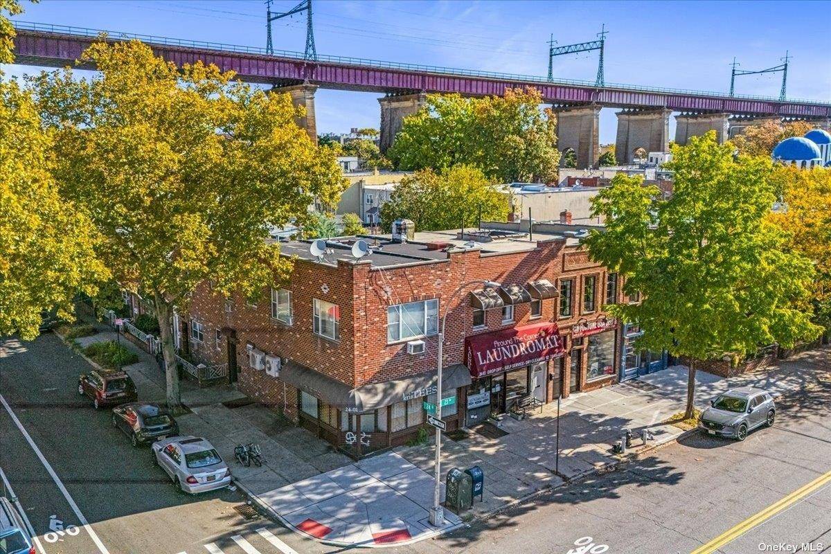 This mixed use property features a street level commercial space, ideal for small retail store, cafe' or office.