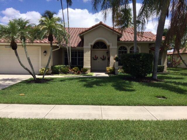 Beautiful and spacious lake view 4 bedroom and 2 bath freshly painted single family home with pool in highly desirable Lakes at Boca Raton Cypress Bend.