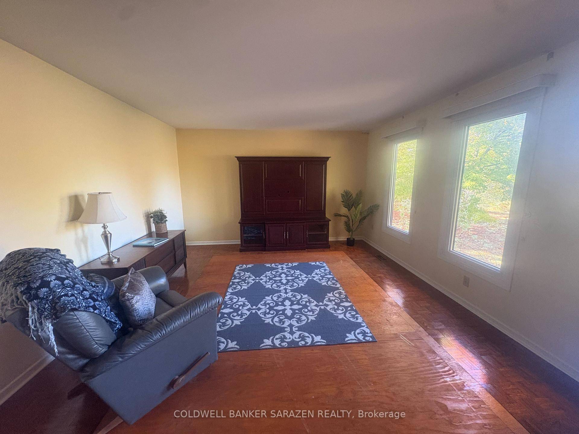 Set back off the road nestled amongst the beautiful maple trees this lovely 3 bedroom high ranch is ready for you to move into.