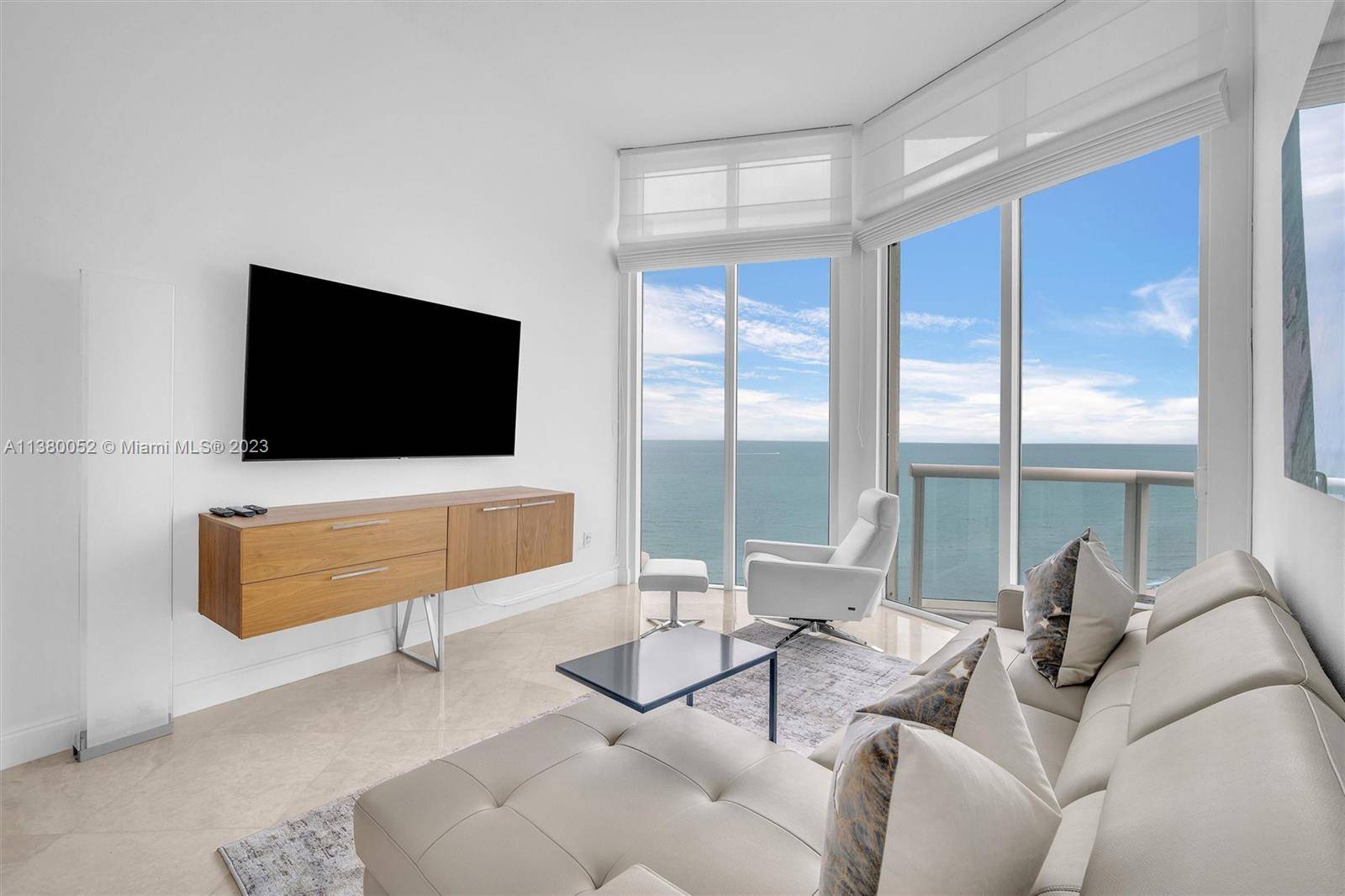Elegantly furnished, Penthouse unit with 12 ft floor to ceiling windows at Bel Aire on the Ocean on the Miami Beach boardwalk.