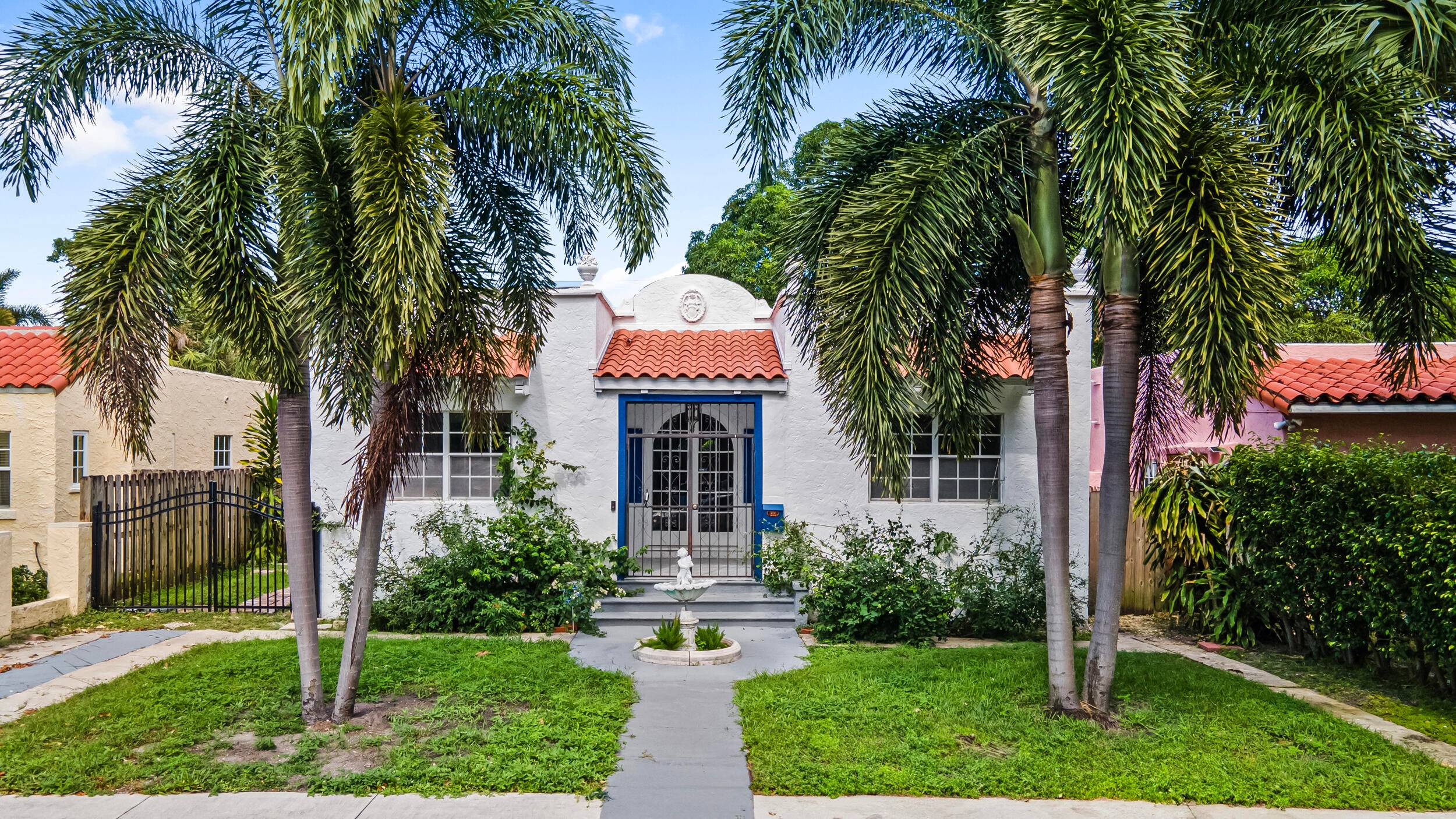 Nestled in the historic Old Northwood district of West Palm Beach, this charming home offers a perfect blend of vintage beauty and character.