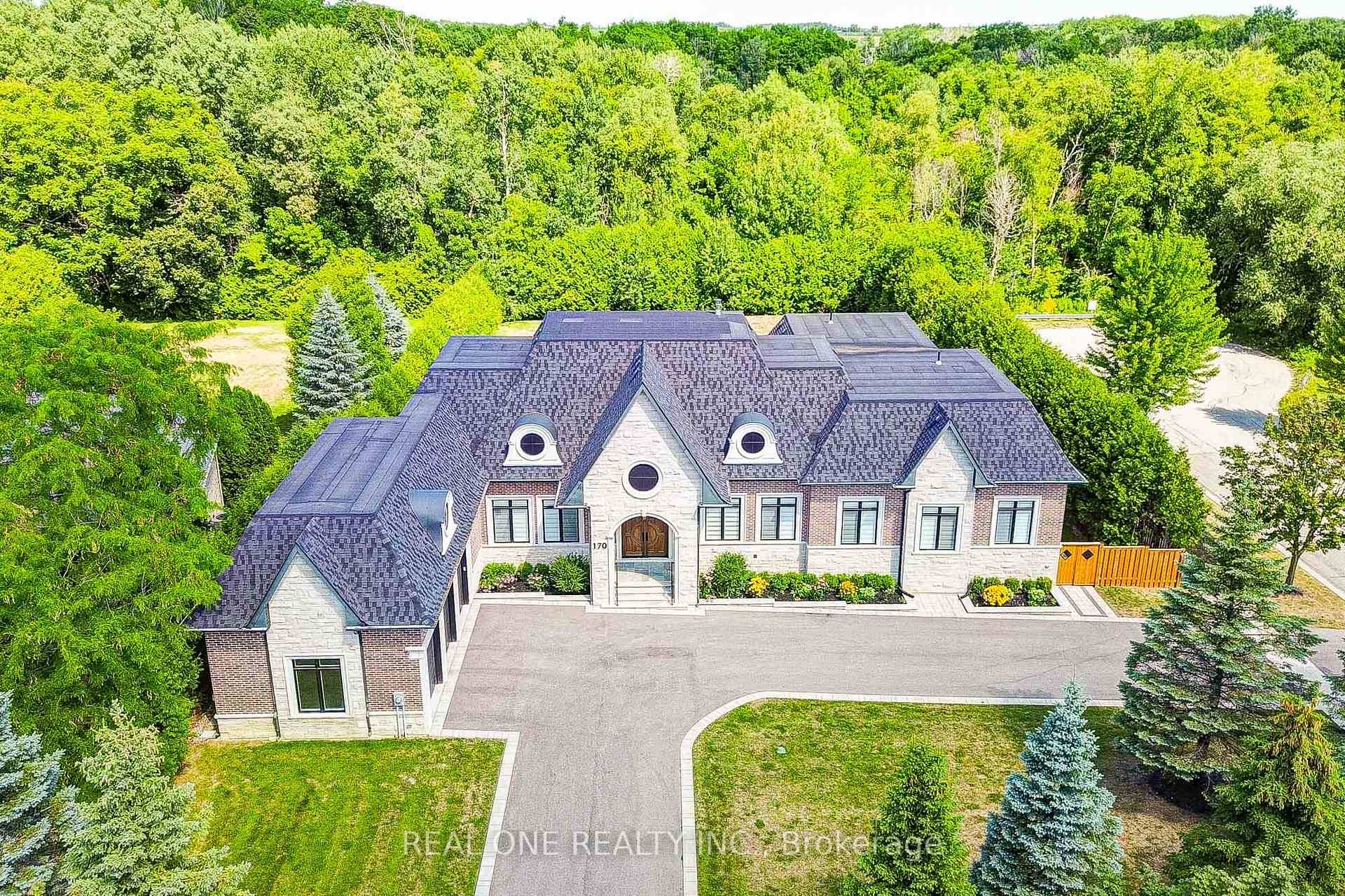 Luxurious Custom Built Bungalow W Over 9, 000 Sqft of Expensive Living Space on a Private, Nearly 1 Acre Lot Backing Onto a Forest Experience refined country living just minutes ...