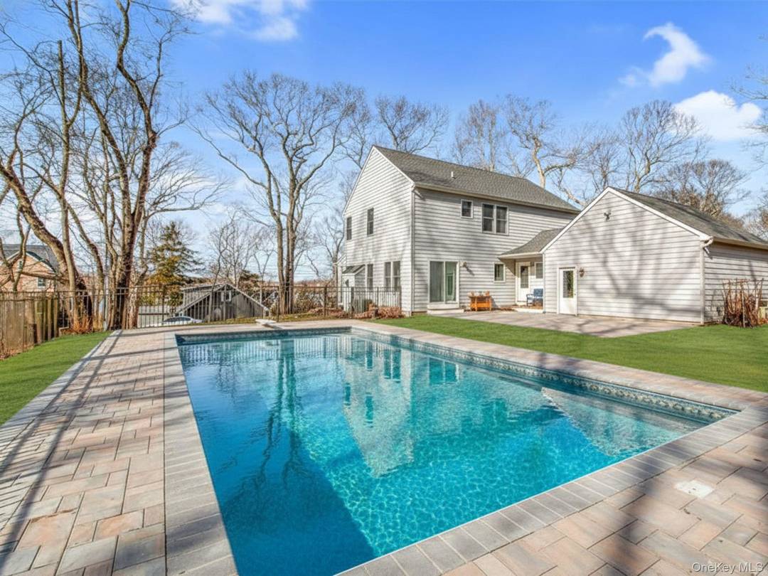 Impressive Goose Creek home with water views and large heated in ground pool !