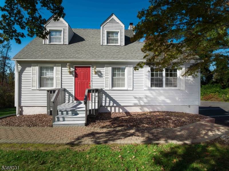 NEW TO MARKET ! Exceptional free standing building located on high visibility Route 10 West.