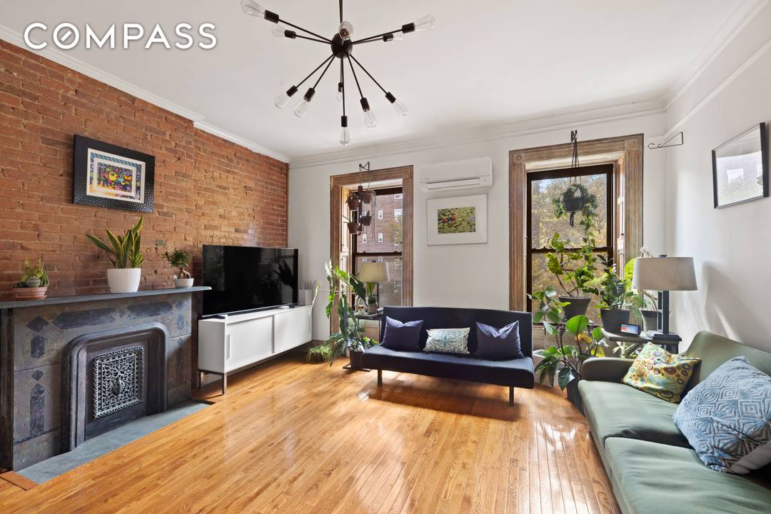 Thoughtfully renovated, this 17 foot wide, 3400 square foot townhouse is currently re configured as 2 separate apartments and can easily be re imagined as a single residence.