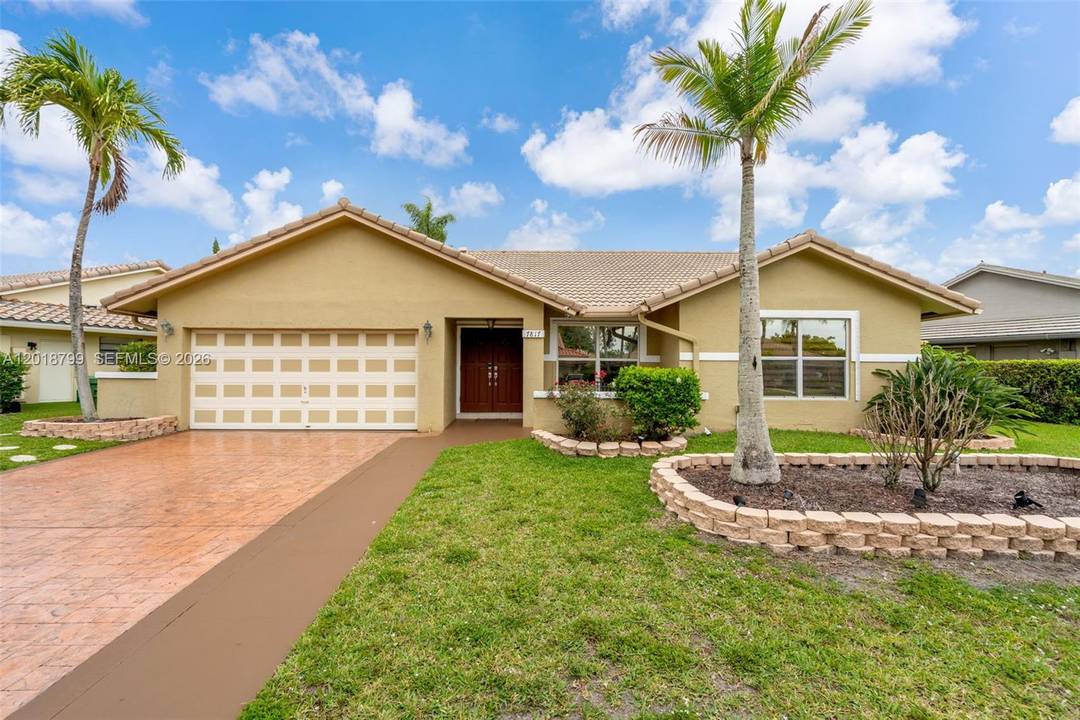 Beautiful 3 bedroom, 2 bath home with a 2 car garage, stamped concrete driveway, and open concept layout, completely updated and move in ready !
