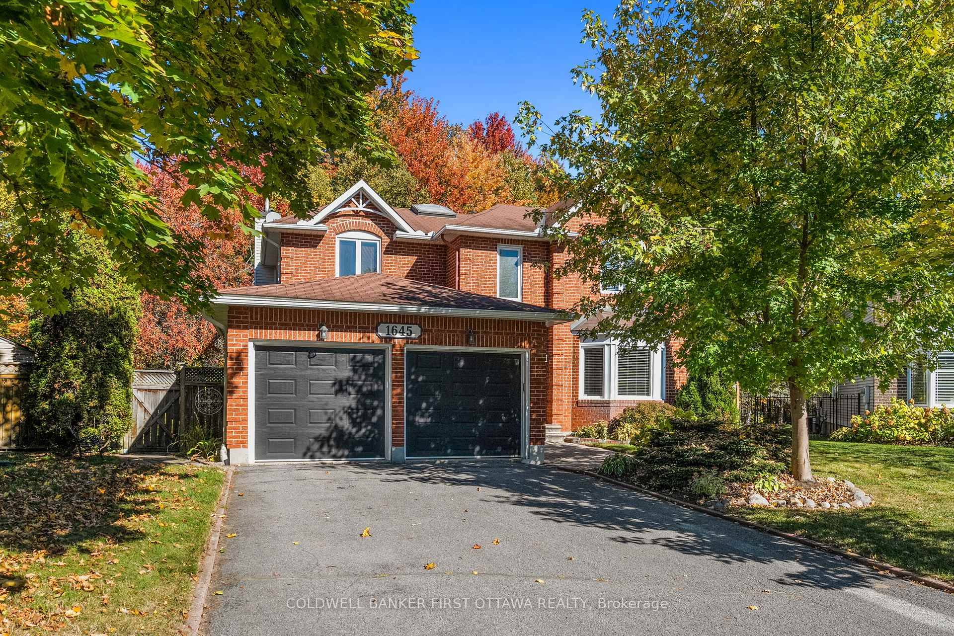 Situated on a large pie shaped lot with ravine views, 1645 Des Ravins sits among a canopy of trees on one of Chapel Hill's most sought after streets.