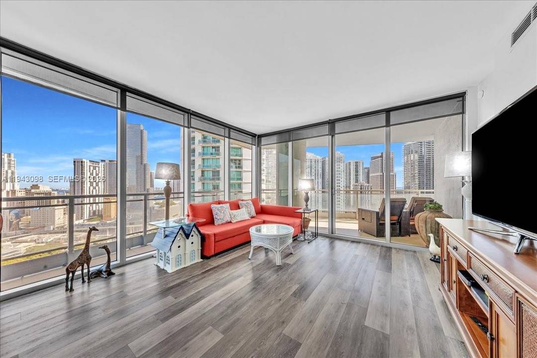 Stunning, completely renovated corner larger residence offers breathtaking views of the Miami skyline.