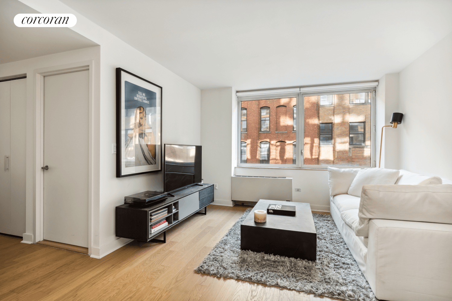 Amazing Alcove Studio with gourmet pass through kitchen with stainless steel appliances, hardwood floors throughout the apartment, solar shades, ample closets, windowed bathroom and in home washer amp ; dryer.