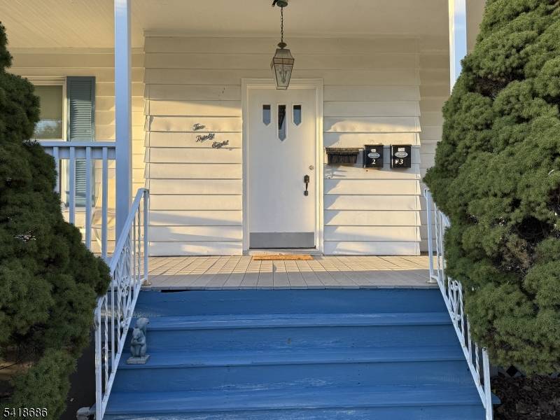 Welcome home to this spacious and light filled 3 4 bedroom apartment located in a stately three family home nestled on a lovely property with a circular driveway.