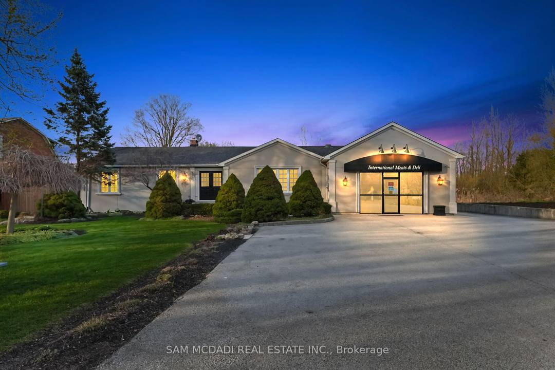Welcome to 11269 Guelph Line, a stunning bungalow estate nestled in Brookville, where refined residential living meets a rare commercial opportunity on a sprawling one acre lot.