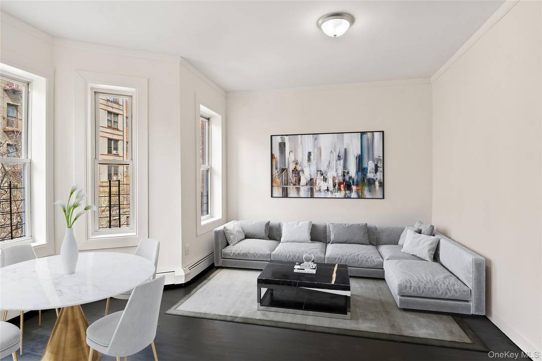 Welcome to 2308 Morris Avenue, a beautifully maintained three unit building located in the heart of Fordham Heights, just steps from the vibrant Little Italy dining district of the Bronx.