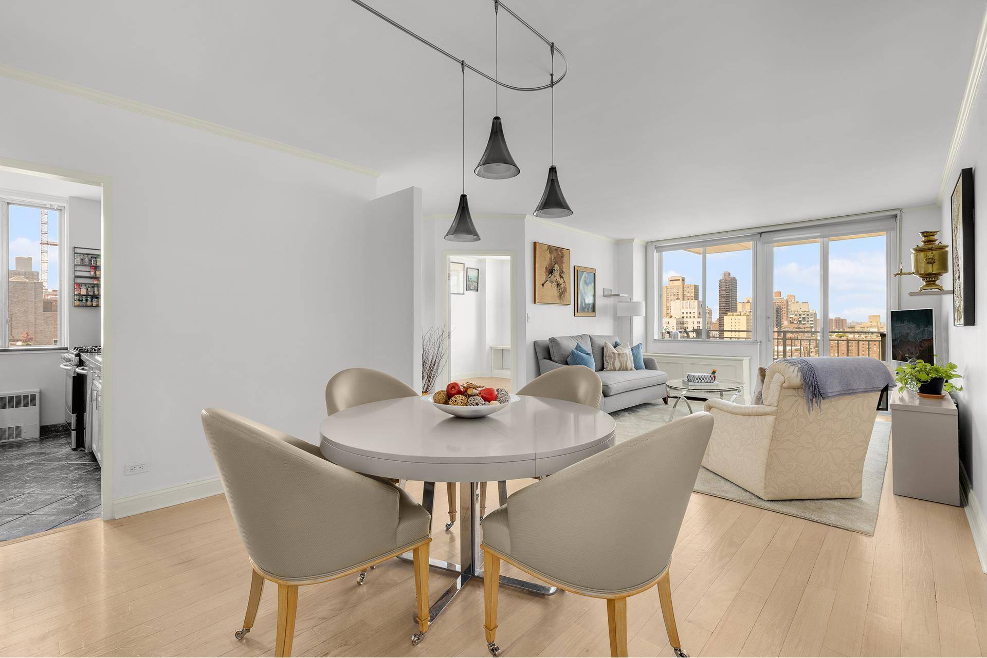 Sun filled high floor 2 bed 2 bath with balcony and Washer Dryer with Low Maintenance !
