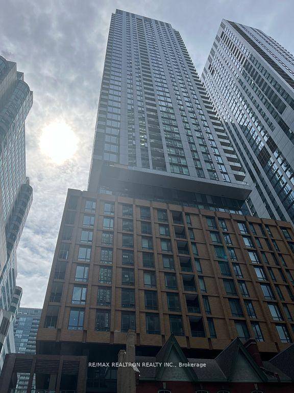 1 Year New Theatre District Condo with 1 Bed 1 Den.
