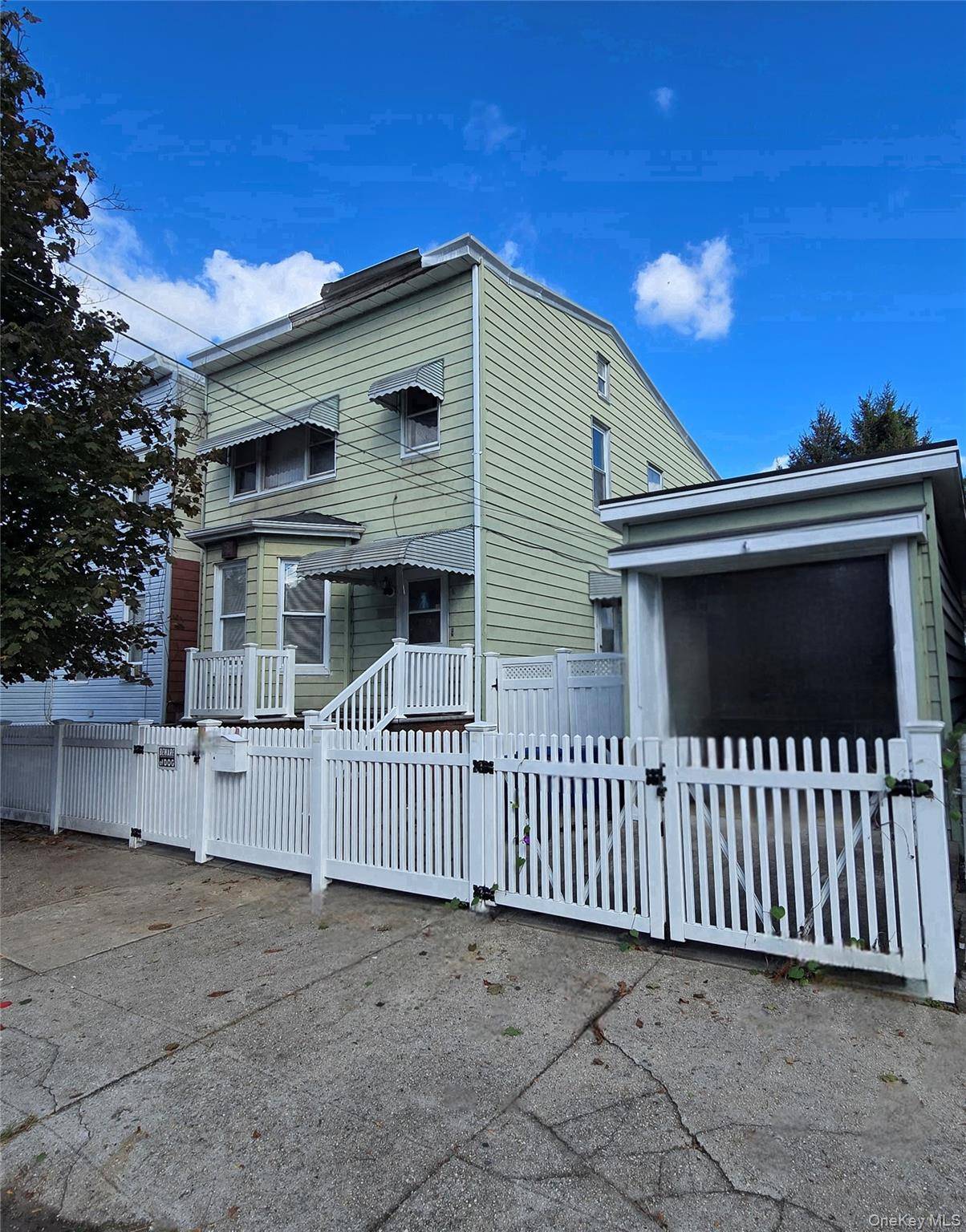 Enormous legal 2 family on a rare double lot in prime Ozone Park !