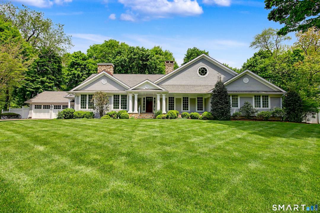 Nestled at the end of a quiet cul de sac in Darien's sought after Tokeneke School District, this beautifully renovated and expanded six bedroom home offers exceptional living inside and ...