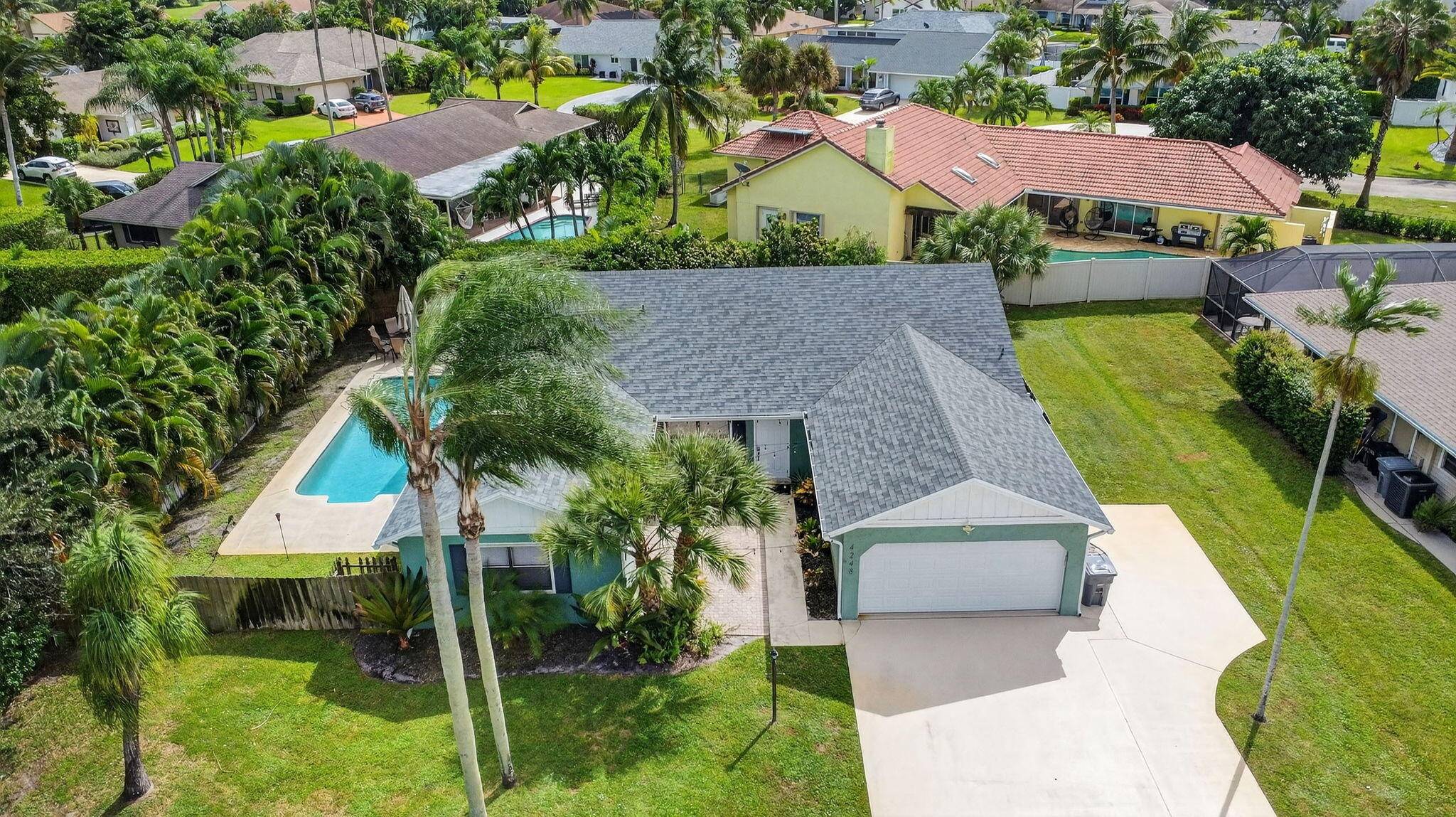 Welcome Home ! Wonderfully updated 3 bedroom, 2 bath pool home situated on a spacious 1 4 acre lot in the highly sought after, guard gated community of Cypress Creek.