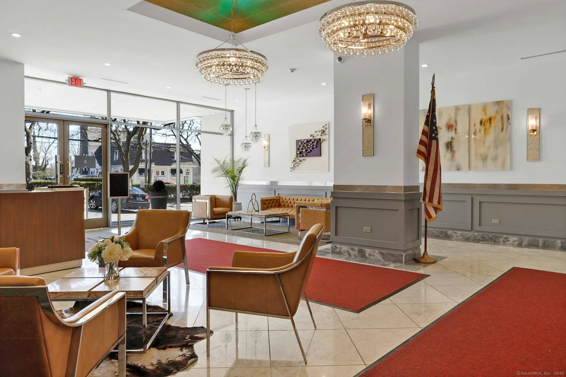 Welcome to this exquisite top floor penthouse a rare corner residence bathed in natural light, offering breathtaking views unparalleled Stamford living.