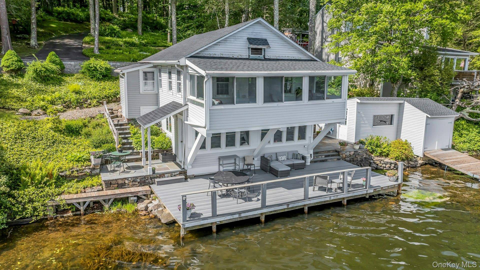 Welcome to your whimsical lakefront paradise on magnificent Lake Oscaleta !