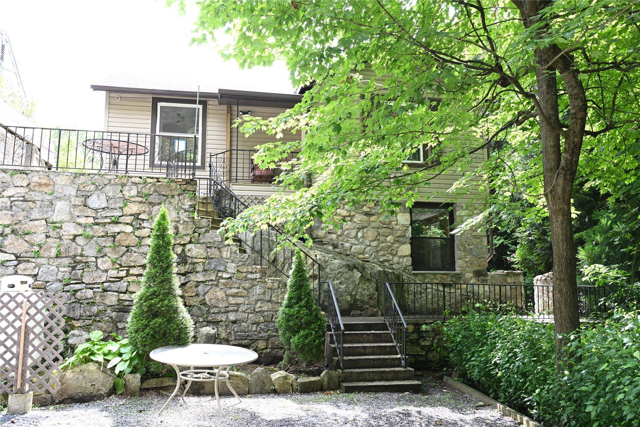 Picturesque Lakeside Legal 2 Family Home with Breathtaking Waterfront Views in Lake Peekskill !