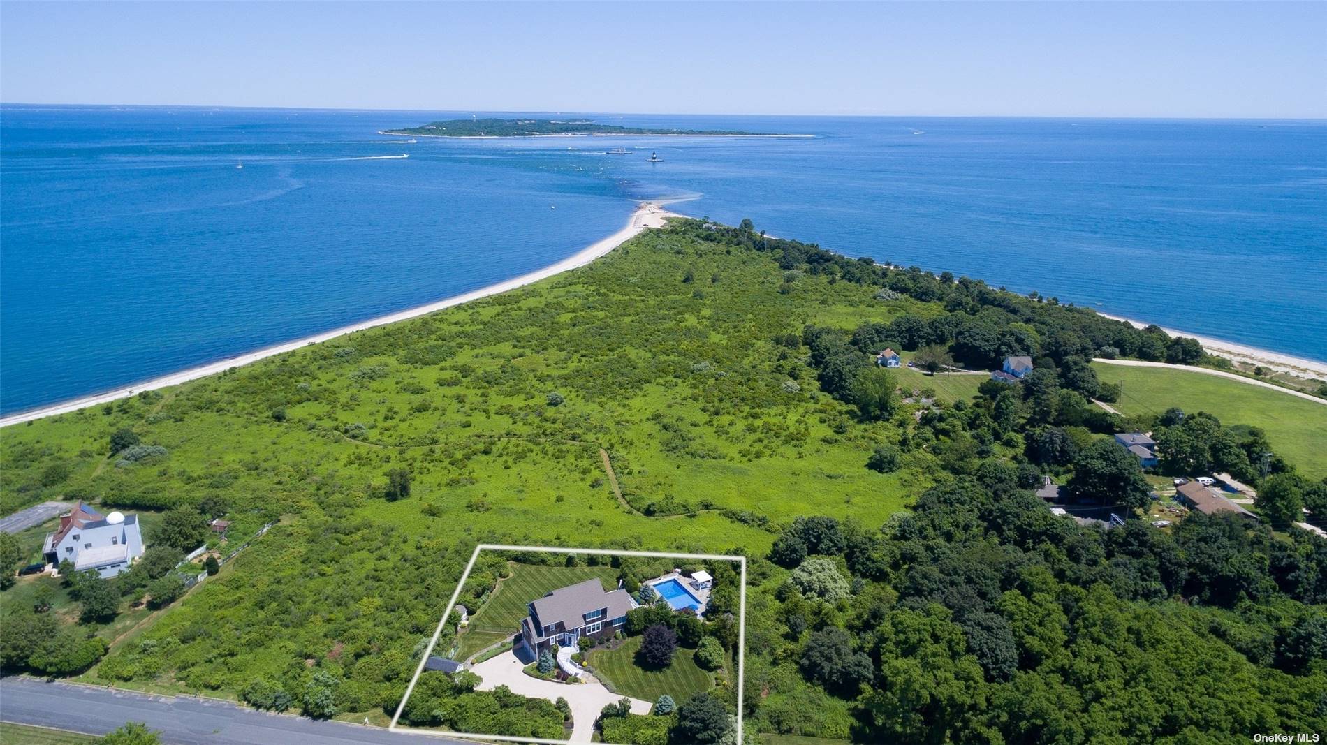 Experience breathtaking views of Long Island Sound and Orient Point County Park from this spacious open concept home.