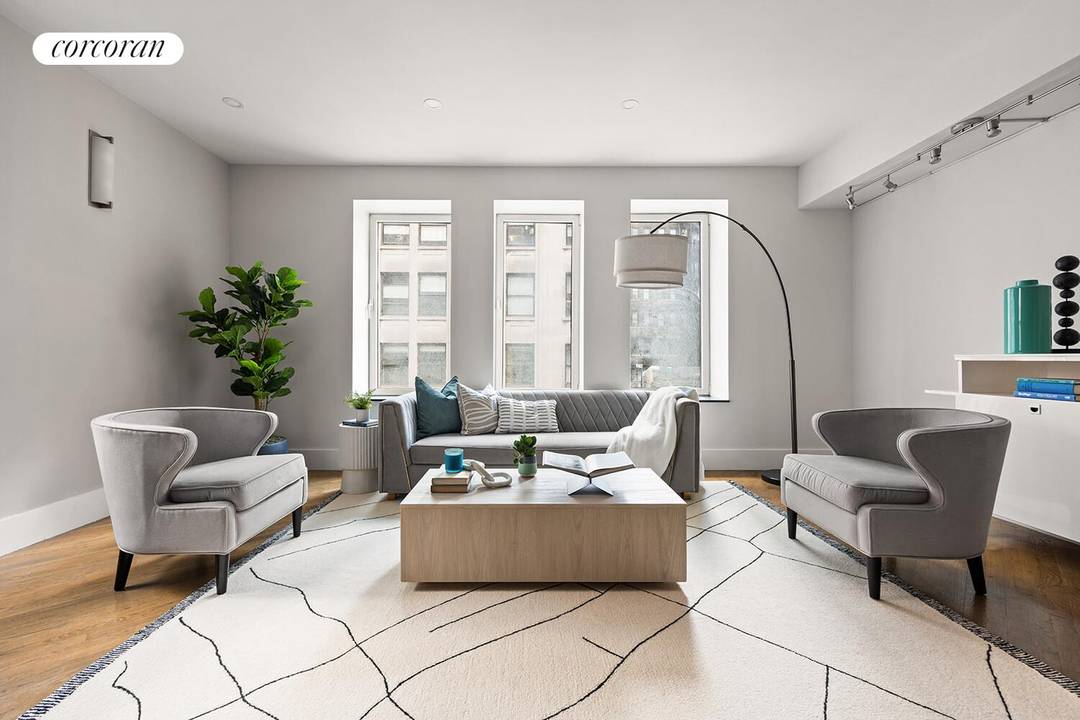 Welcome to 24 West 45th Street, Unit 8, a distinguished full floor prewar condominium residence situated in the vibrant heart of Midtown West, New York City.